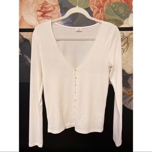 White long sleeve shirt with pearl buttons